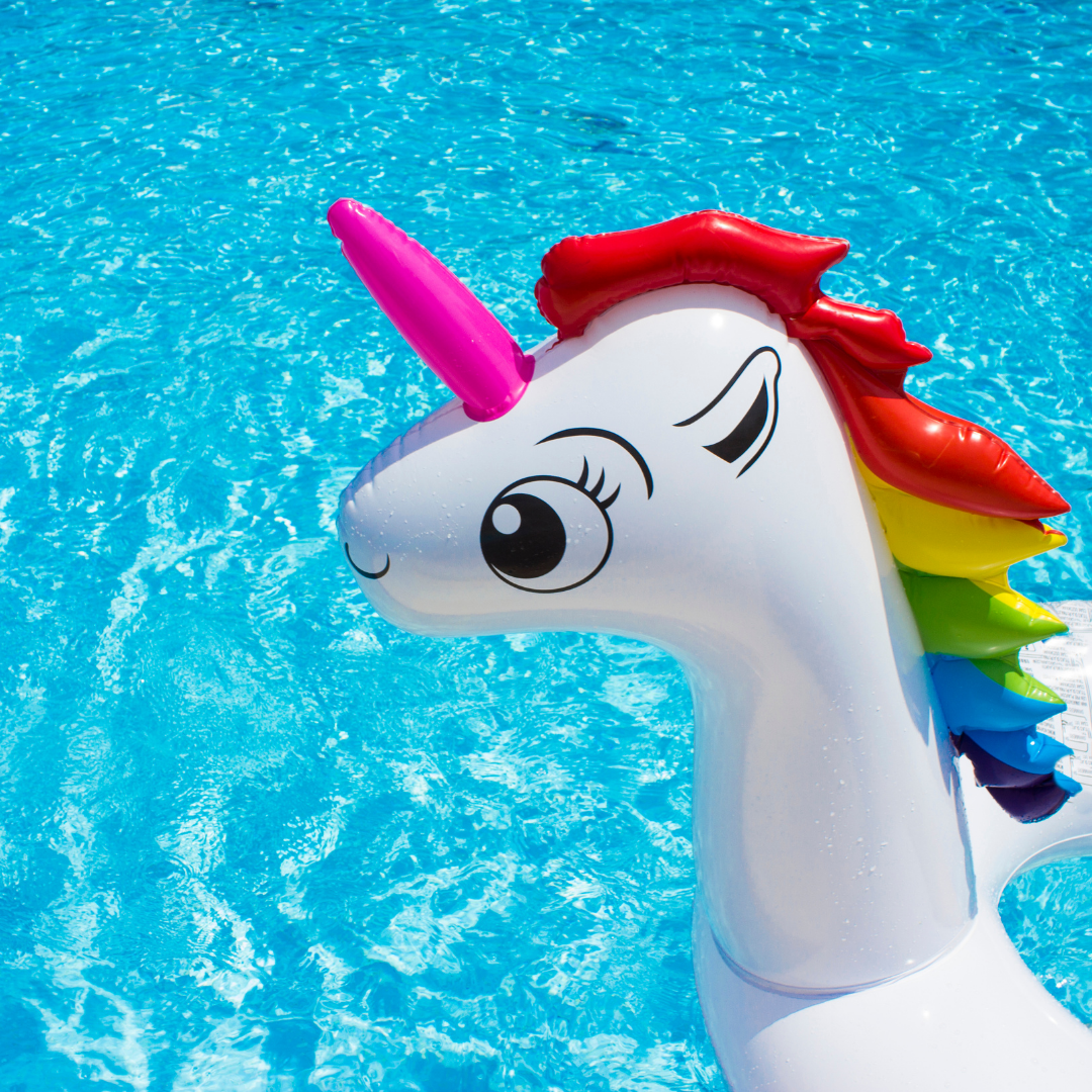 unicorn pool floatie in pool